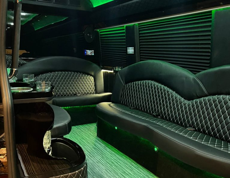 Arvada Limo 4 Interior of Limousine showcasing elegant black seats and refreshment area.