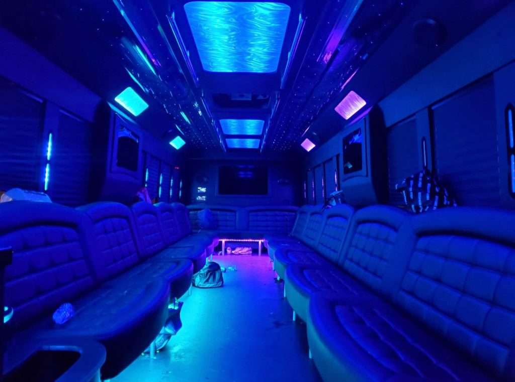 Arvada Limo 6 Blue and pink lights inside a party bus.